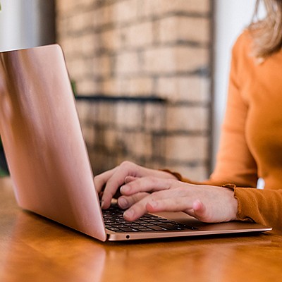 A woman working on her laptop