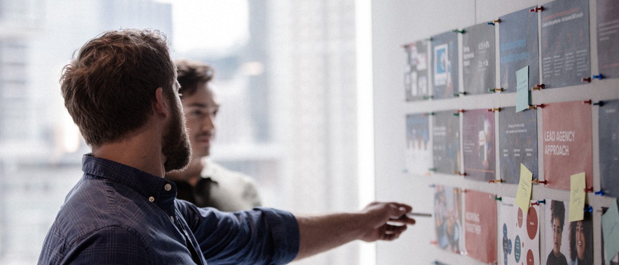 two men working on presentation