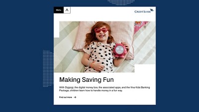 a small girl laying on the bed smiling