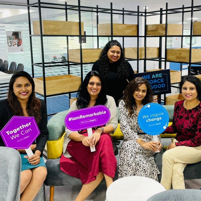 Group of women holding signs