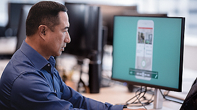 Man sitting at a desktop computer