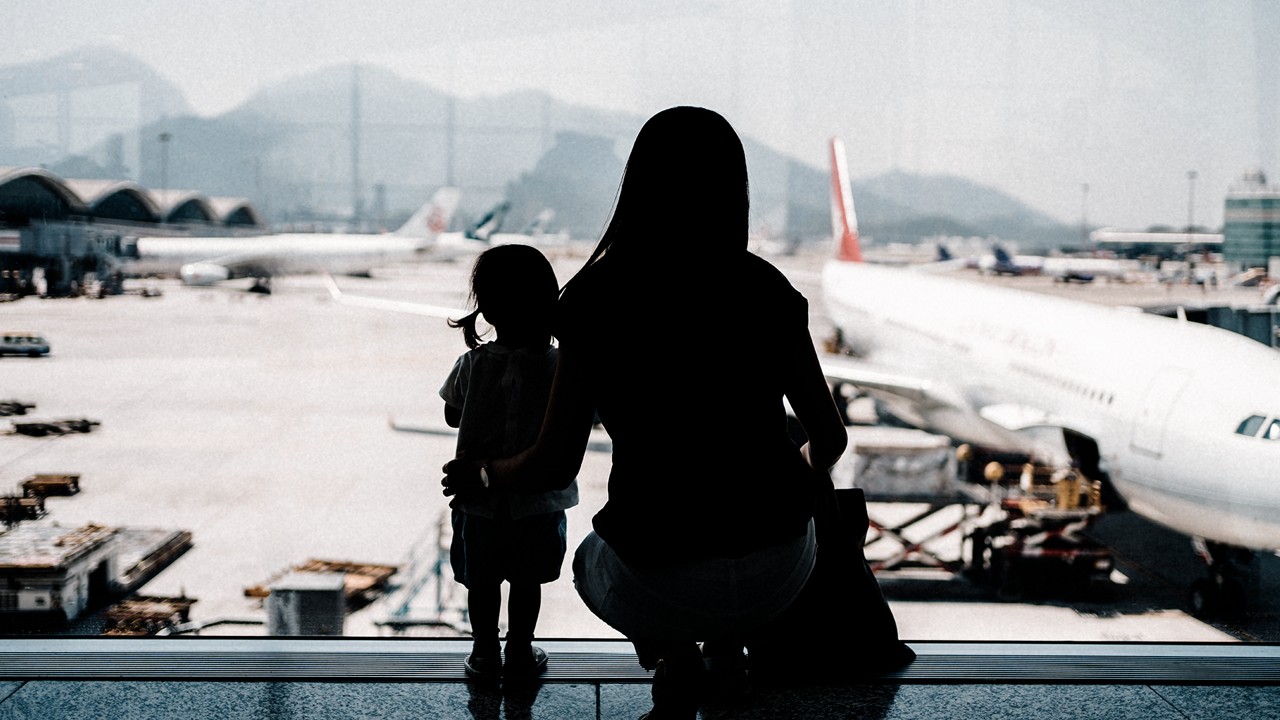 mother & daughter at airport