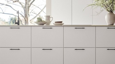 Kvik white counter tops in a modern kitchen setting