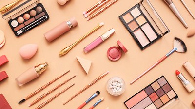 Flat lay of assorted makeup cosmetics