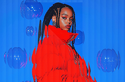 woman in red coat on blue background