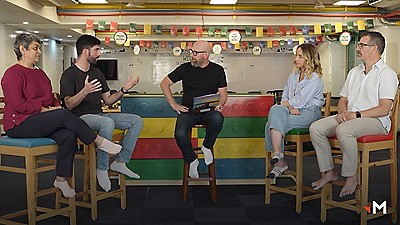 Group of people sitting in discussion