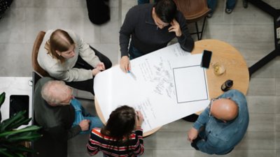 Colleagues brainstorming at a table