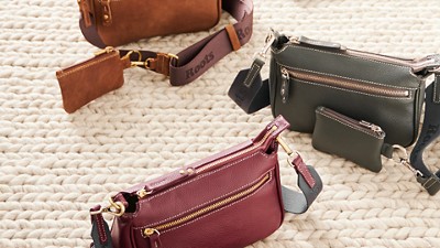 Assortment of Roots purses in various colors