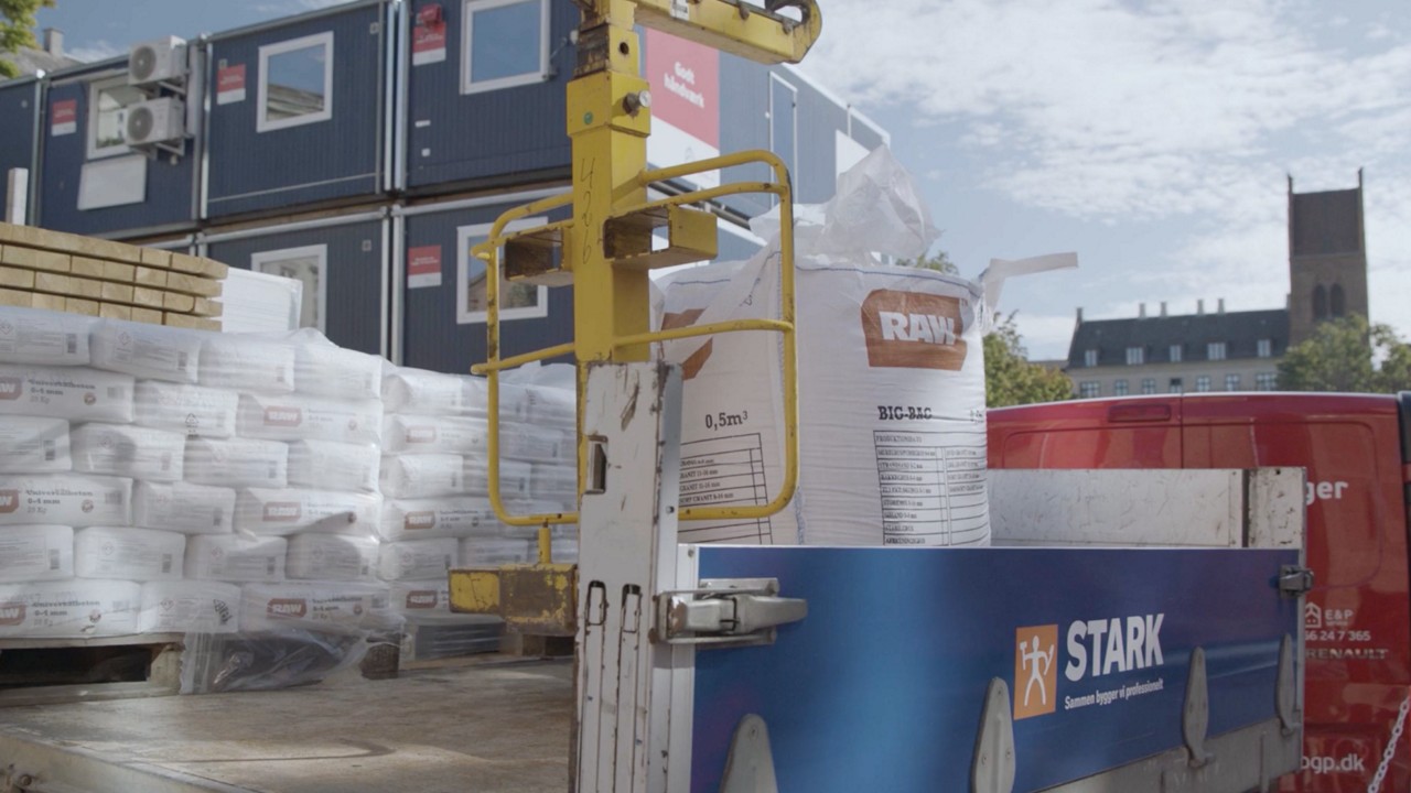 Container with stark logo and packaging
