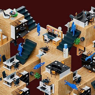 A group of figures representing people are arranged in a scale model cubicle setup, showcasing a small office environment.
