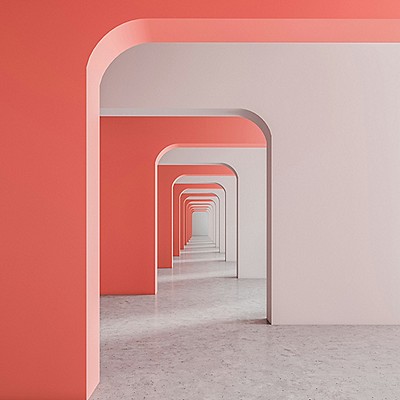A long hallway featuring vibrant red walls and clean white floors, creating a striking visual contrast